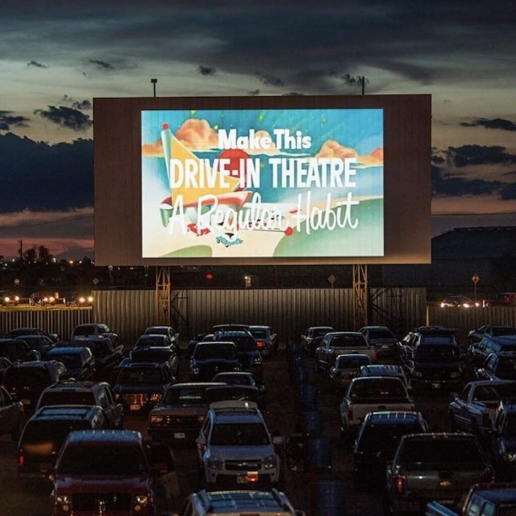 a drive in movie theater at night